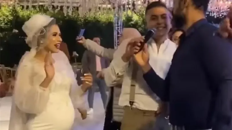 صاحب جلسة التصوير يكشف سر العروس الحامل.. حكاية حفل زفاف أغضب السوشيال ميديا | شاهد