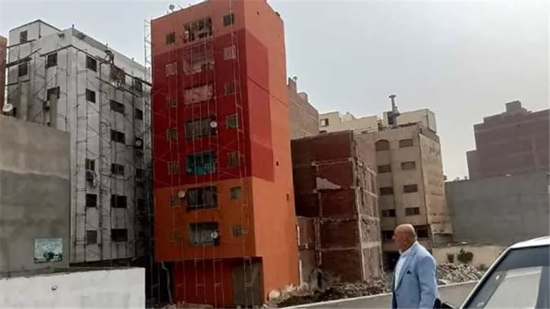 سر طلاء عمارات الدائري باللونين البيج والبرتقالي