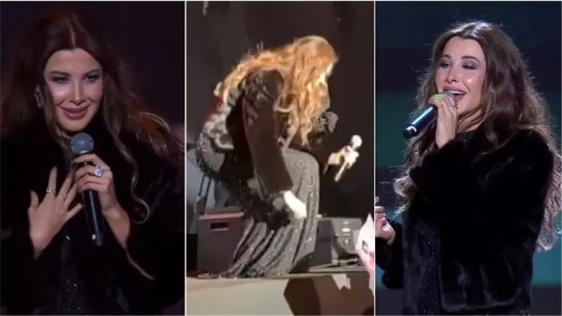نانسي عجرم تقفز من على المسرح وتتفاجأ بهذا الموقف | شاهد
