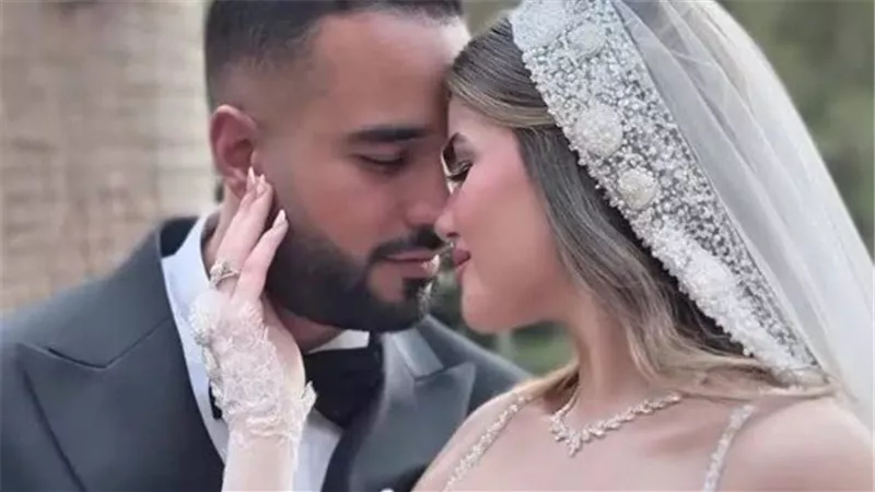  إطلالة ملكية تخطف الأنظار.. ابنة محمد فؤاد تثير ضجة في حفل زفافها | شاهد